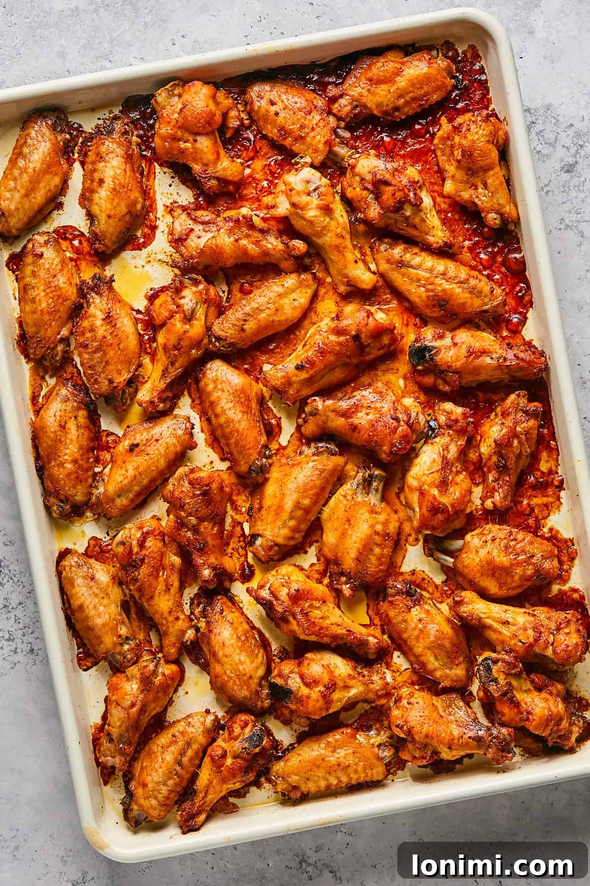 oven roasted chicken wings on a sheet pan