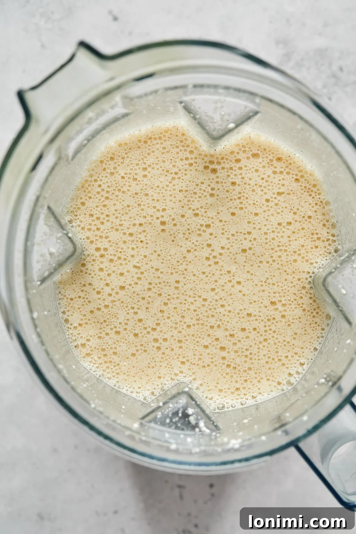 egg whites, protein powder and almond milk in a blender