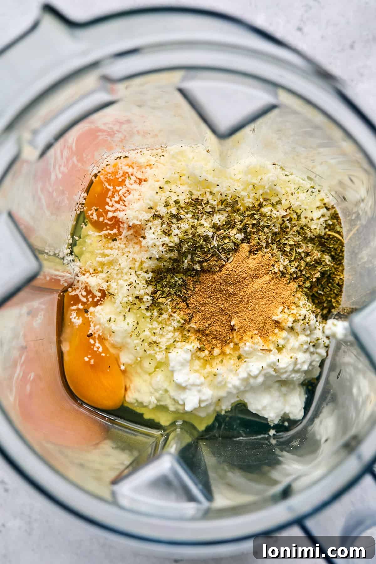 eggs, cottage cheese, and spices in a blender