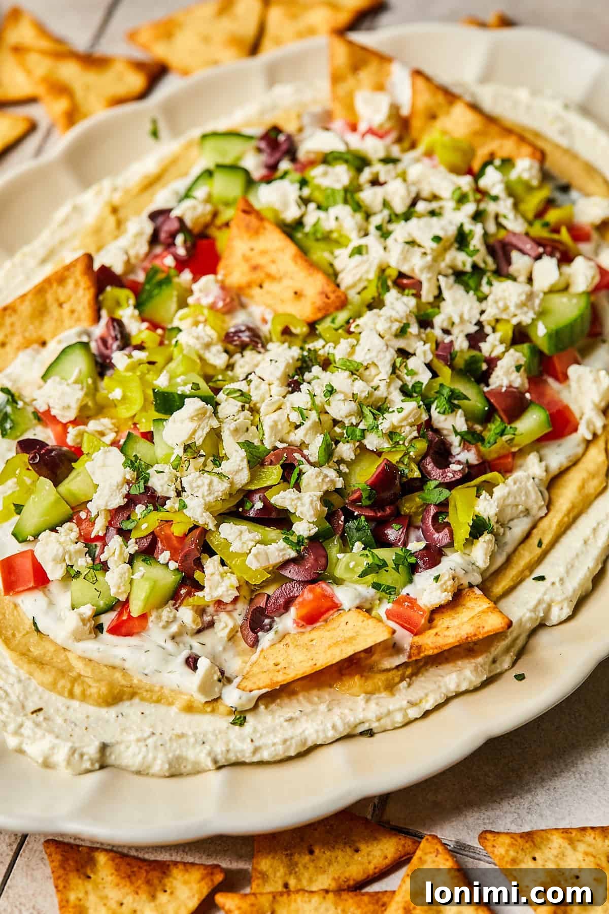 Effortless Mediterranean Layered Feta Dip 12 a side view of Greek dip