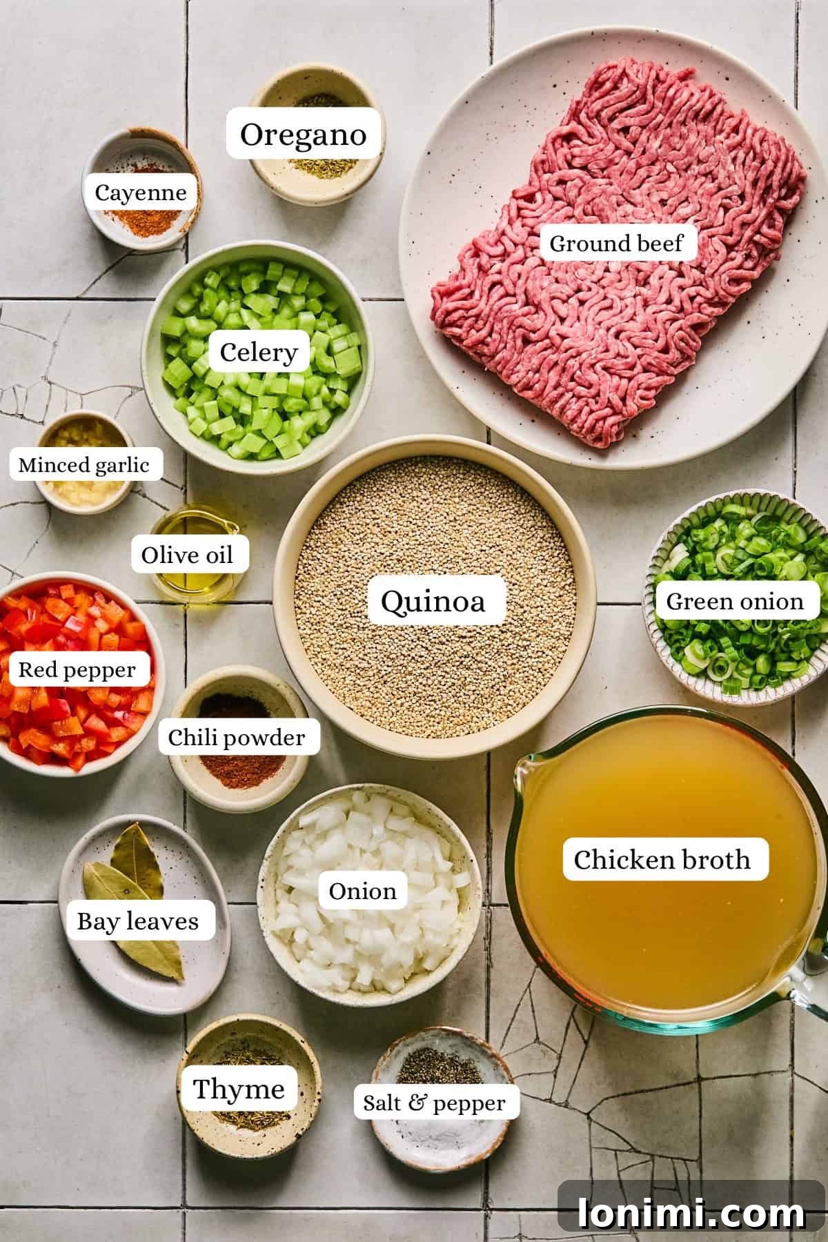 A collection of fresh Dirty Quinoa ingredients, meticulously arranged in small bowls and clearly labeled for easy identification.