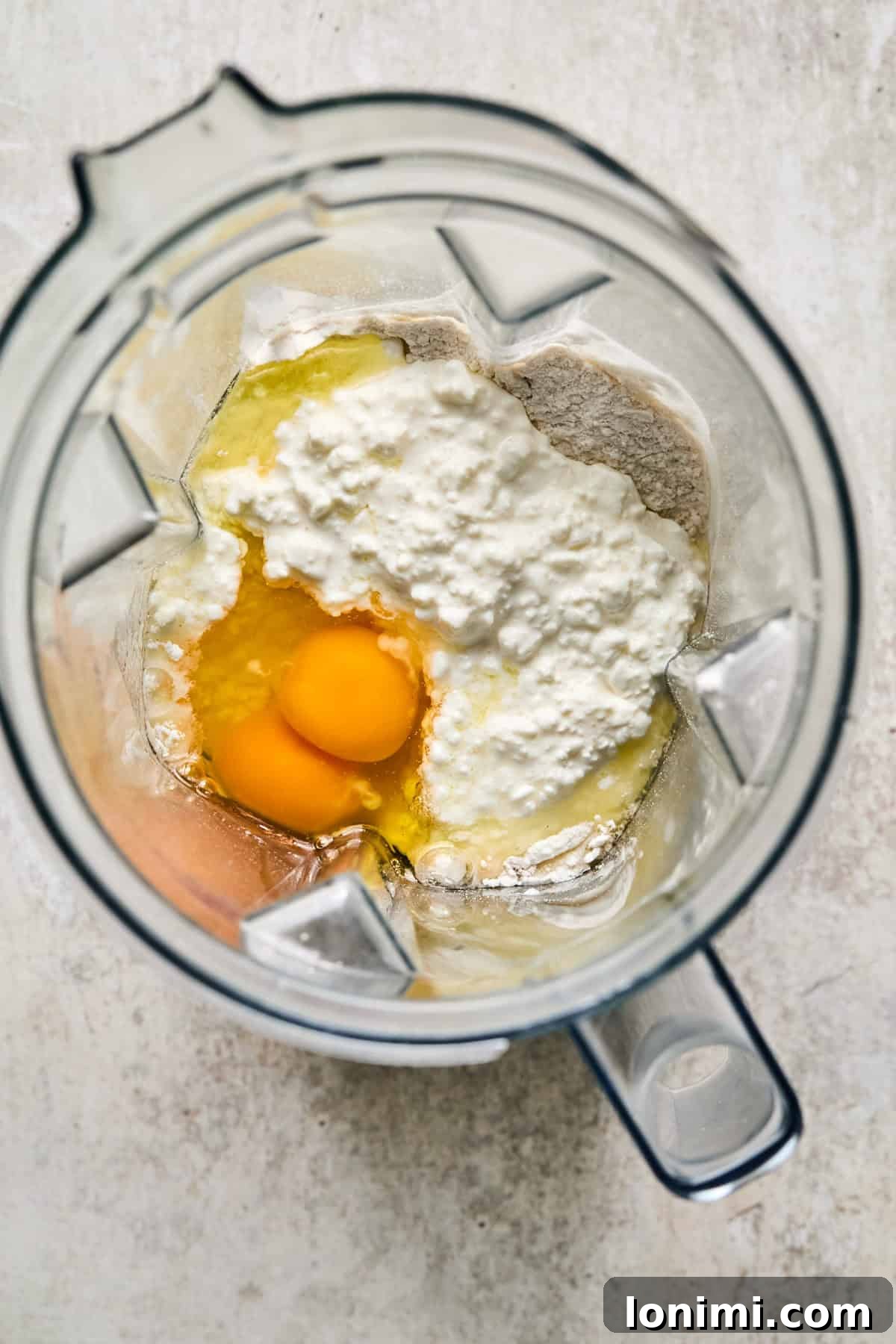 Ultimate Cottage Cheese Protein Pancakes 4 All the pancake ingredients are placed in a blender, ready to be processed into a smooth batter. The pancake mix is added last.