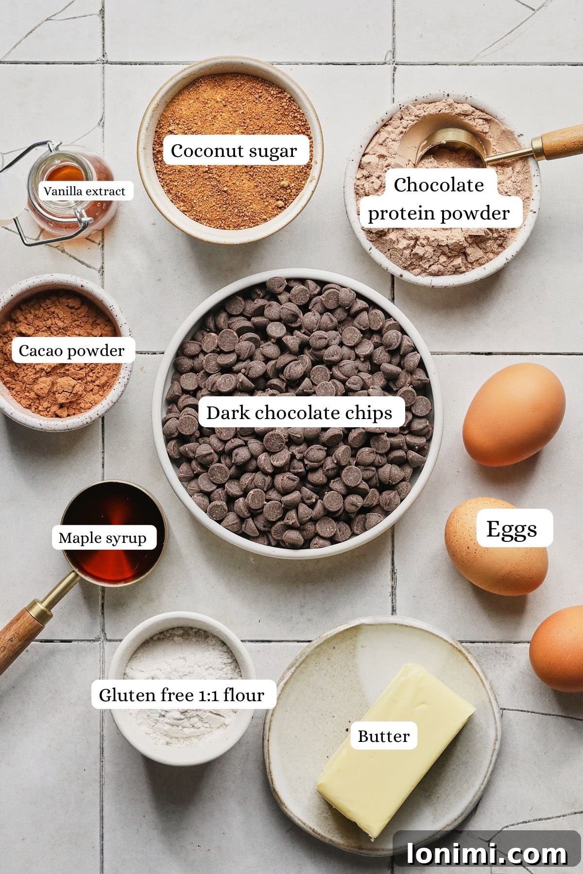 Rich Fudgy Protein Brownies With 7g Protein And A Clean Taste 3 Ingredients for homemade gluten-free protein brownies, including protein powder, cacoa, and eggs.