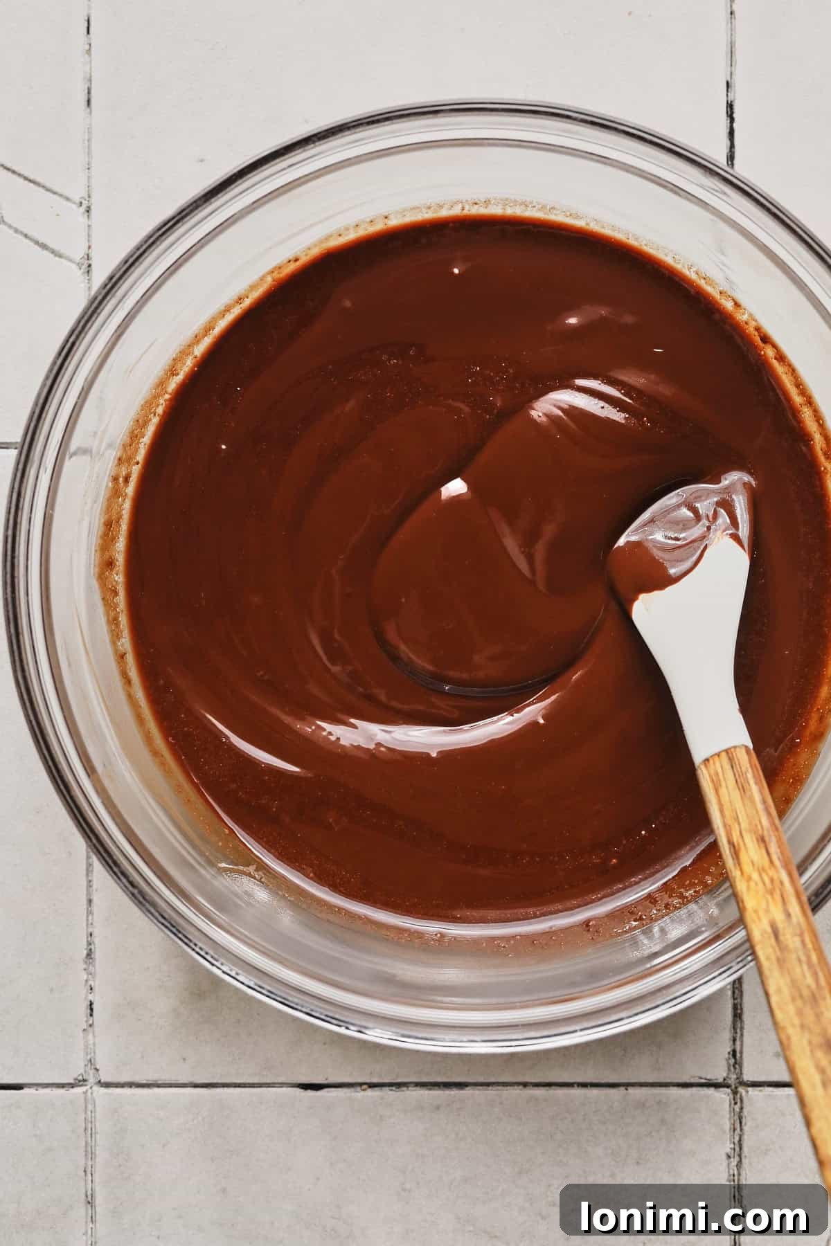 Rich Fudgy Protein Brownies With 7g Protein And A Clean Taste 4 Melted chocolate and butter mixture in a bowl.