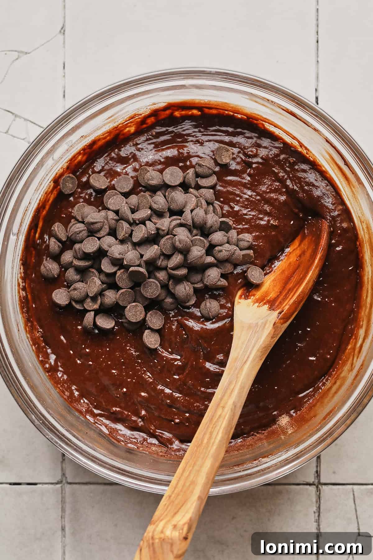 Rich Fudgy Protein Brownies With 7g Protein And A Clean Taste 7 Stirring chocolate chips into high-protein brownie batter