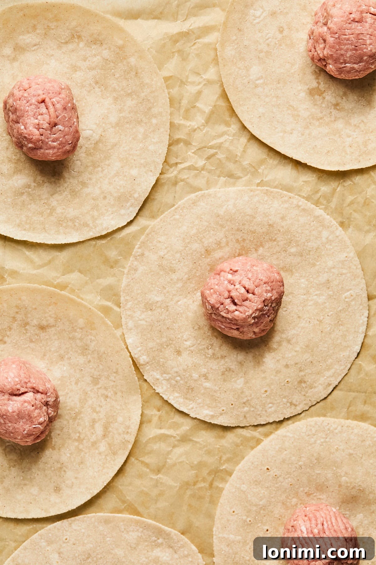 balls of turkey meat on tortillas
