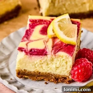 Lemon Raspberry High Protein Cheesecake Bars
