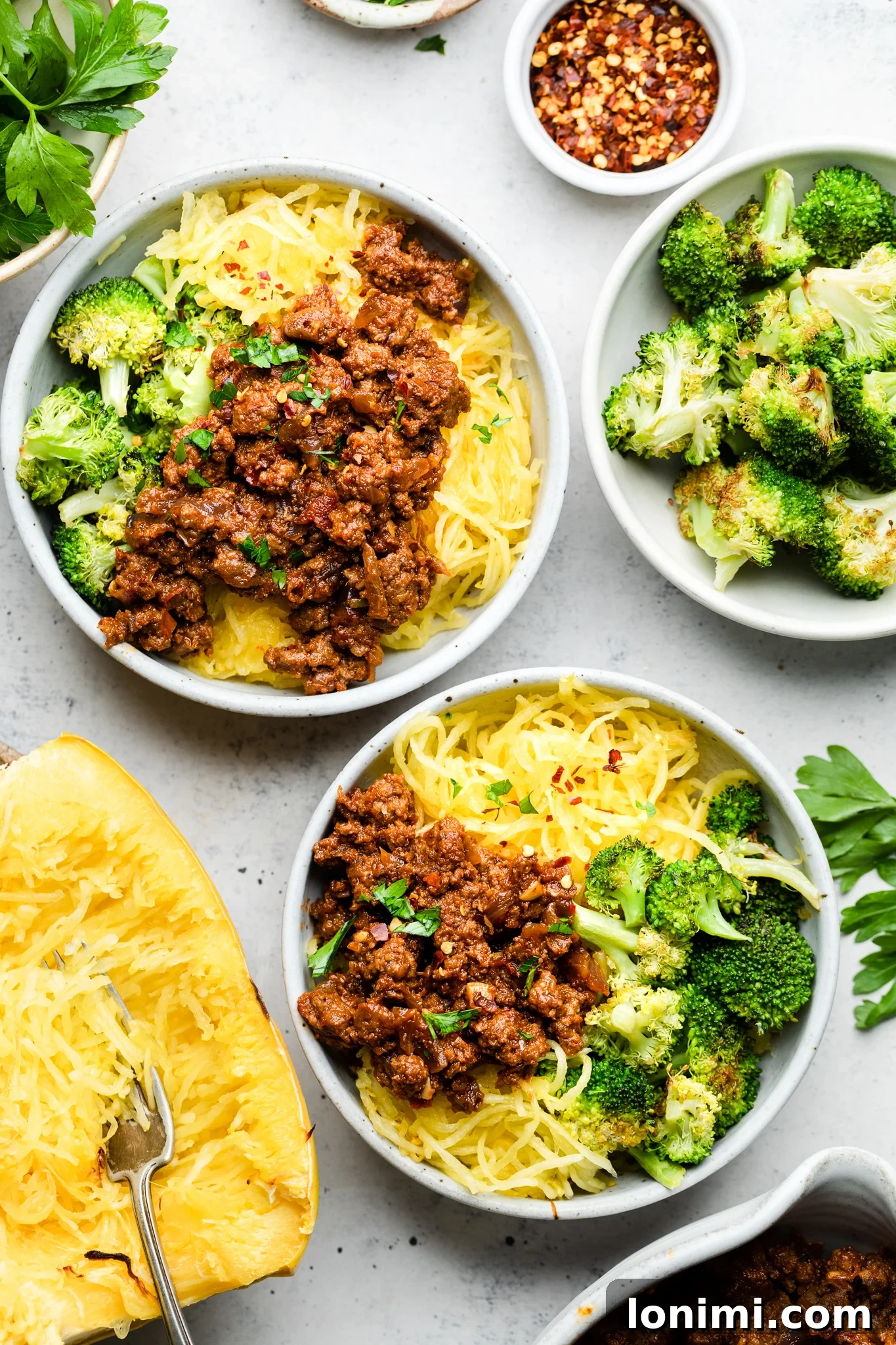 Whole30 Sloppy Joe Bowls served with spaghetti squash and roasted broccoli, a healthy and quick dinner idea.