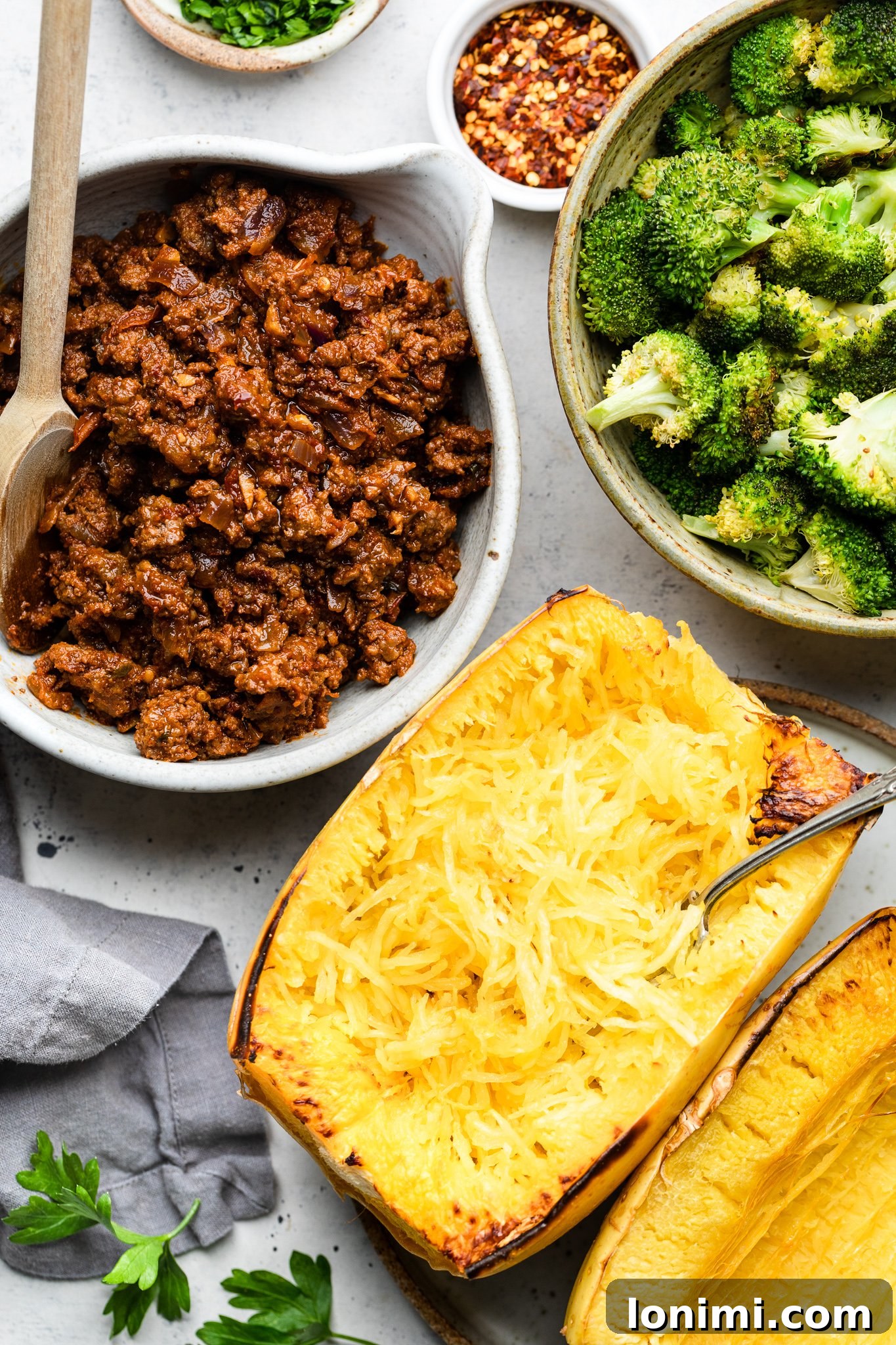 A bowl of Whole30 Sloppy Joes with a side of crispy roasted broccoli, showcasing a vibrant and healthy meal.