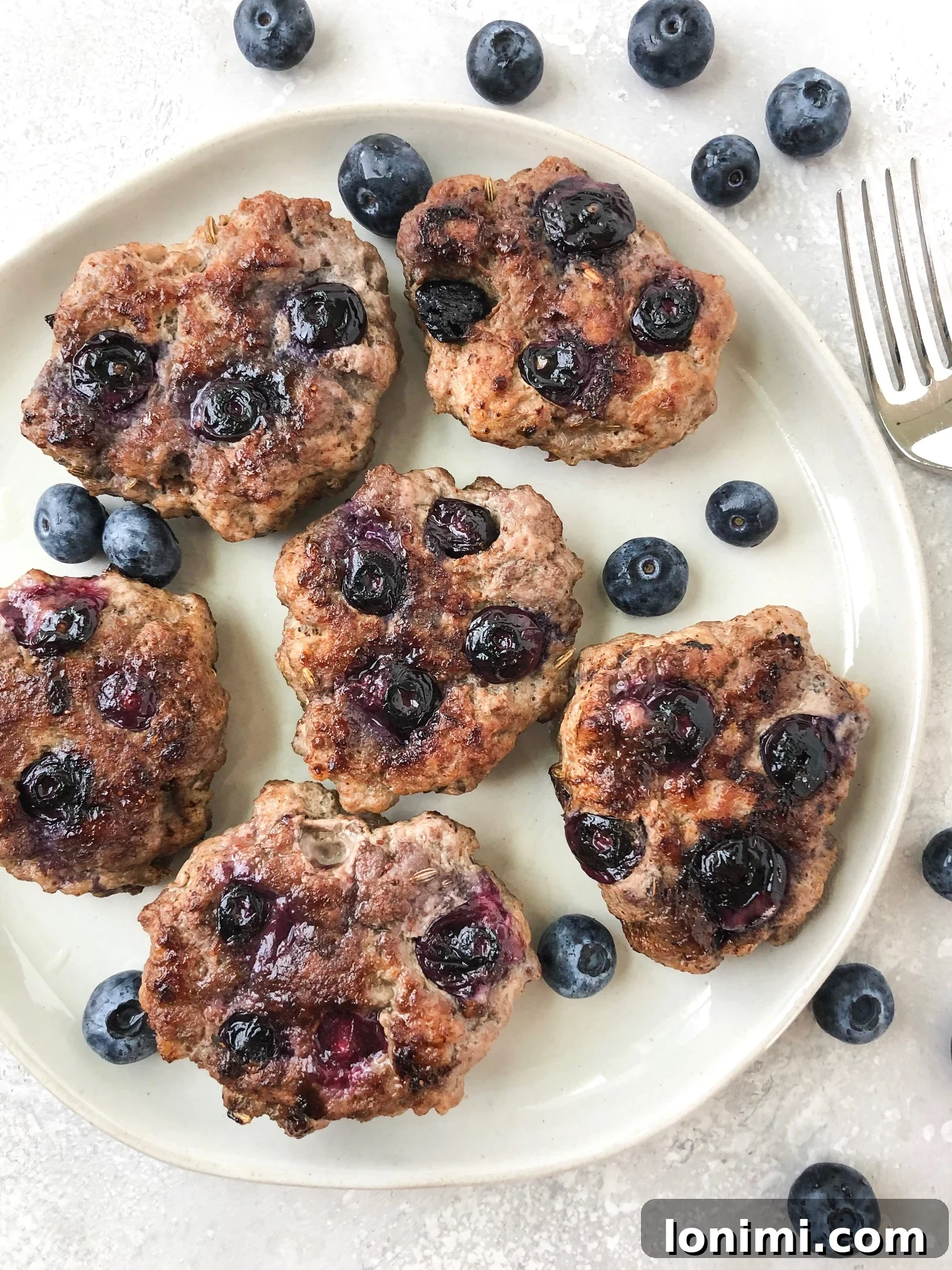 Homemade Blueberry Breakfast Sausage patties on a plate