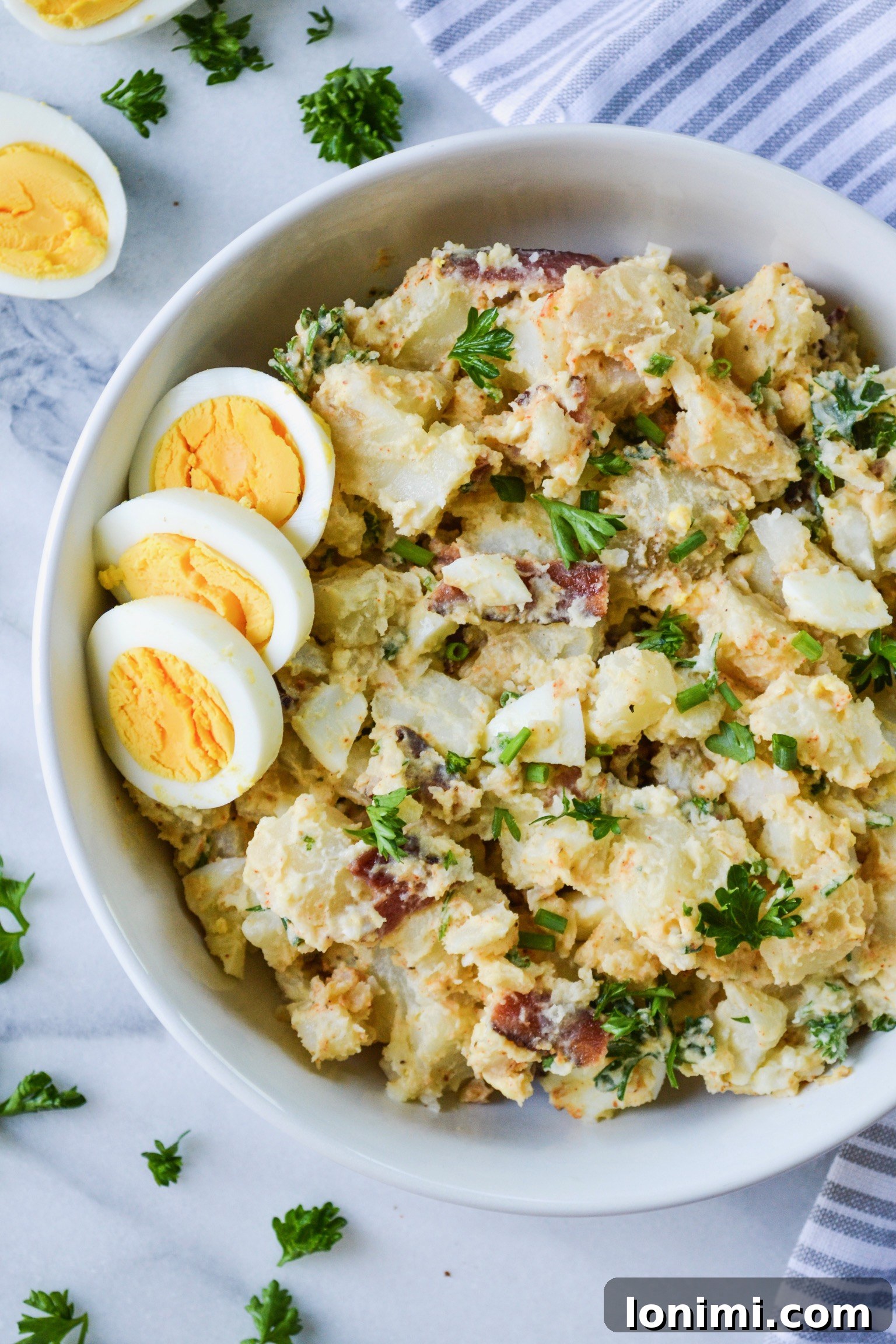 Labor Day Weekend Rewind 8 Creamy Whole30 deviled egg potato salad, a healthy take on a BBQ classic