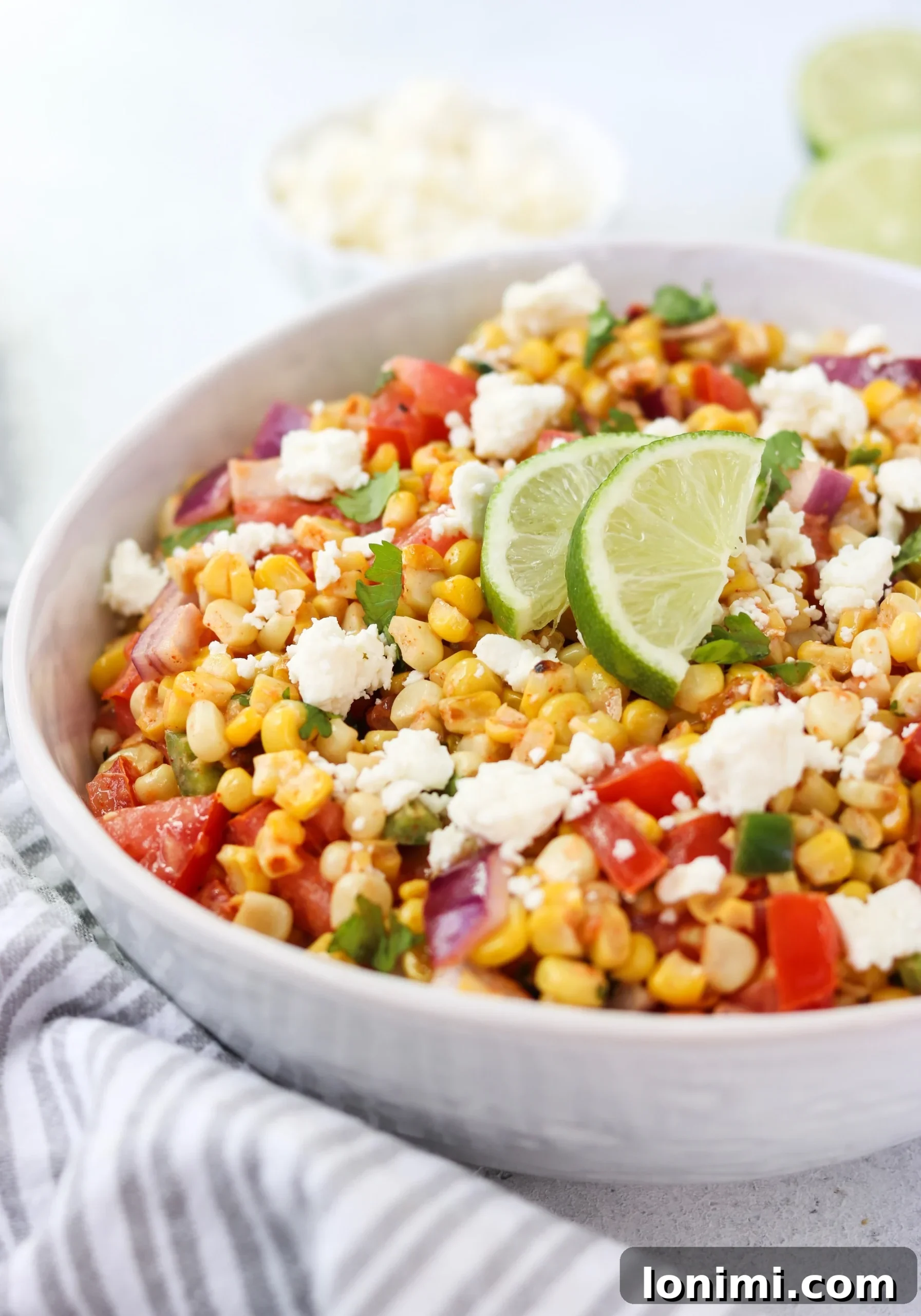 Labor Day Weekend Rewind 13 Vibrant Mexican street corn and tomato salad, a zesty and flavorful side