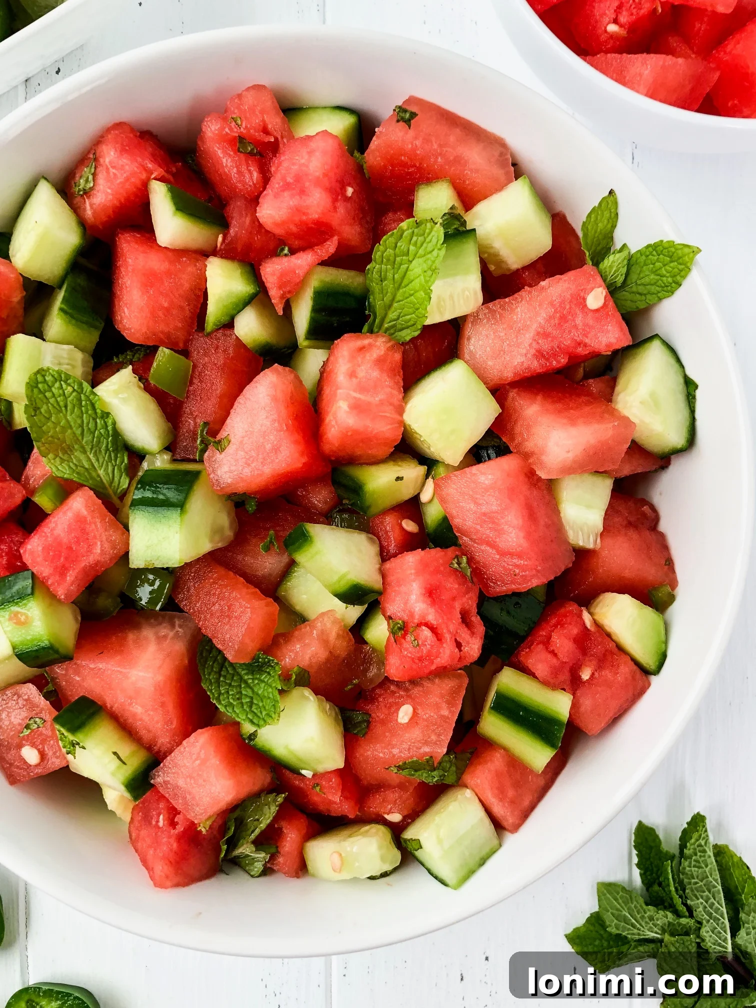Labor Day Weekend Rewind 12 Refreshing Whole30 watermelon cucumber salad with fresh mint