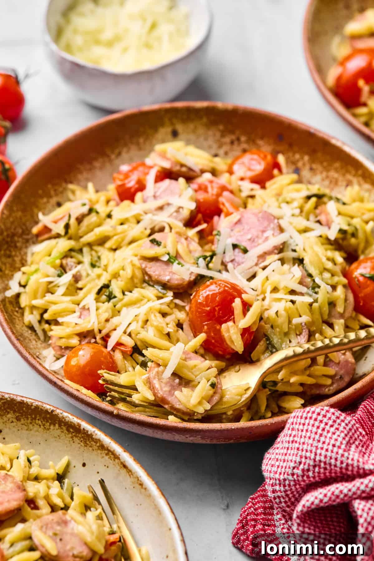 Close-up of baked orzo on a plate, ready to eat.
