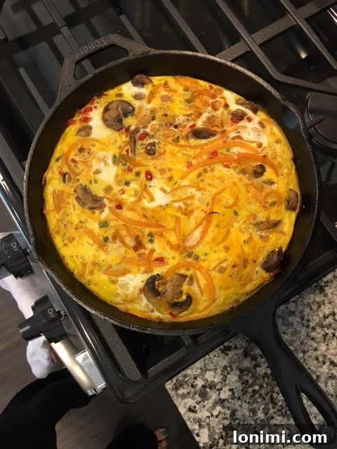 Delicious Butternut Squash Noodle Frittata in a pan, ready to be served.