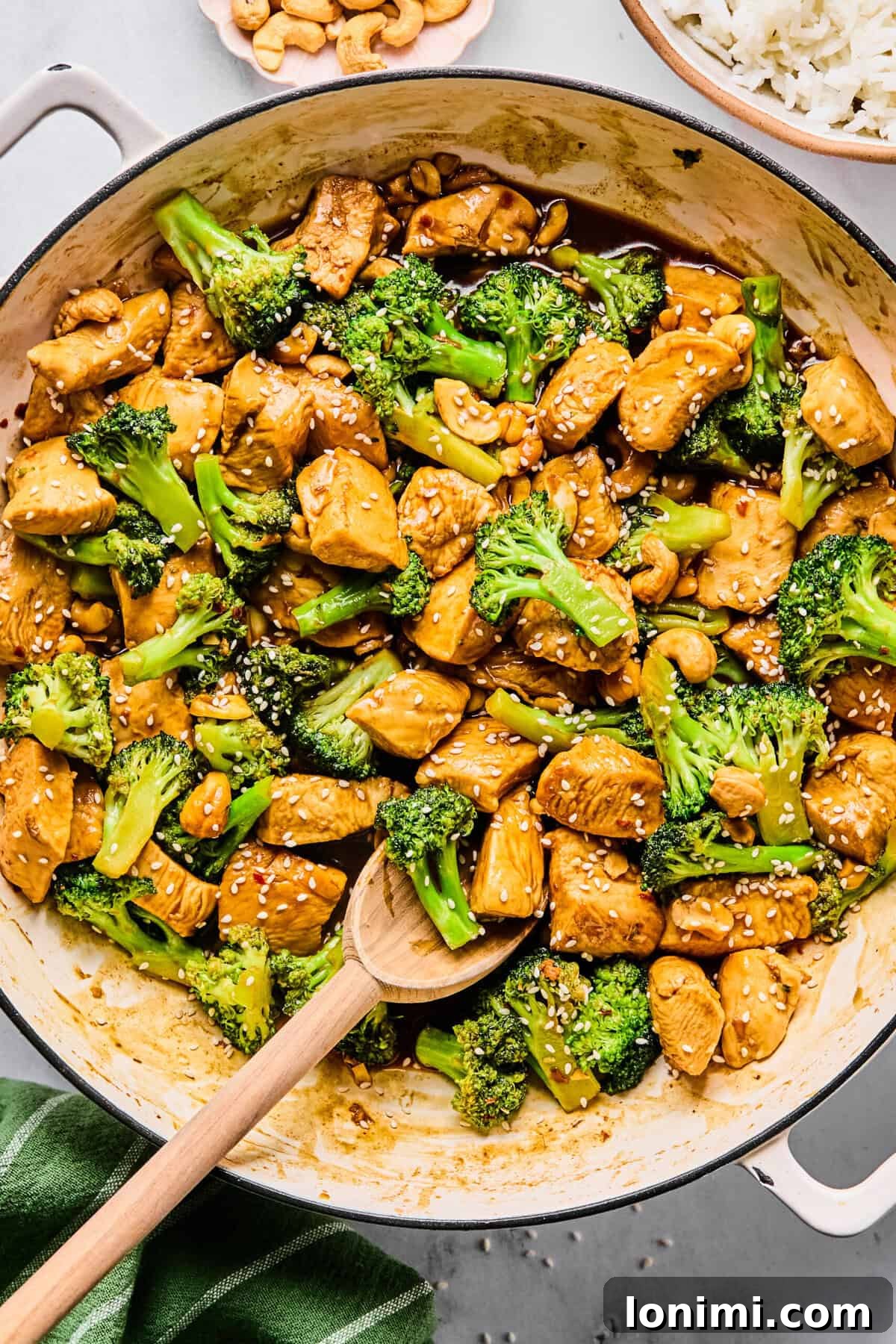 a skillet of chicken broccoli stir fry