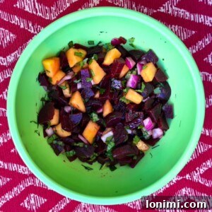 A beautifully presented Peachy Beet Salad, fresh and vibrant.