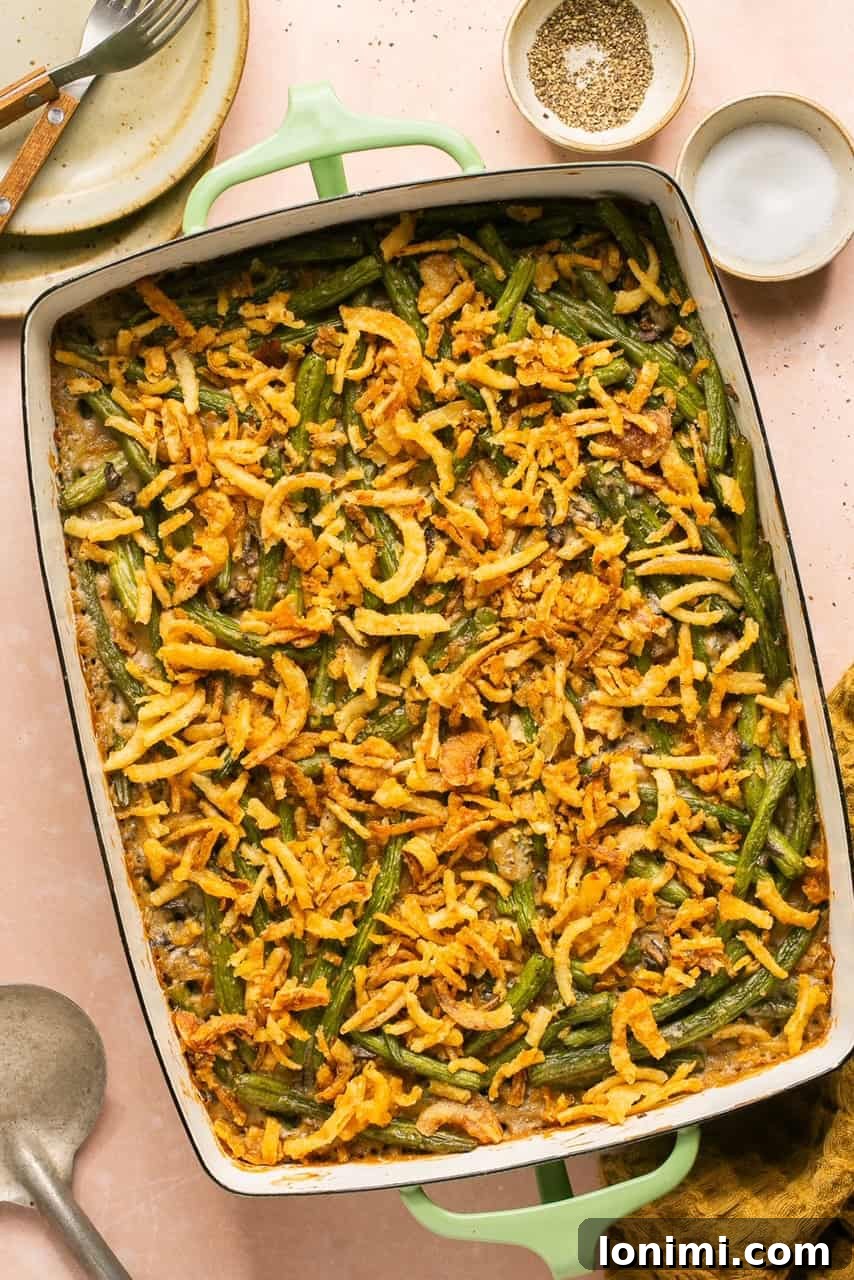 an overhead shot of gluten-free green bean casserole in a large baking dish 