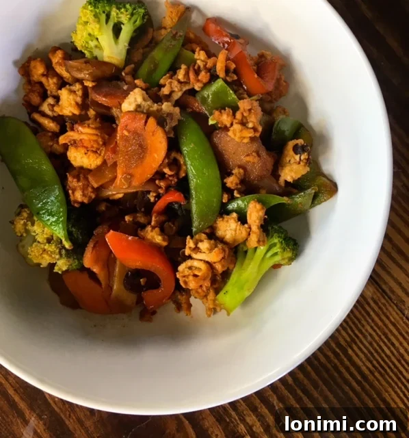 Wok-Kissed Turkey & Veggie Delight 2 Delicious and healthy Chinese Turkey Stir-Fry served in a bowl, perfect for a quick Whole30 compliant meal.