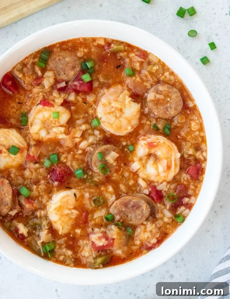 25 Hearty Whole30 Soups, Stews, and Chilis 3 Spicy and savory Instant Pot Jambalaya Soup, Whole30 compliant and perfect for a quick meal with chicken, sausage, and vegetables.