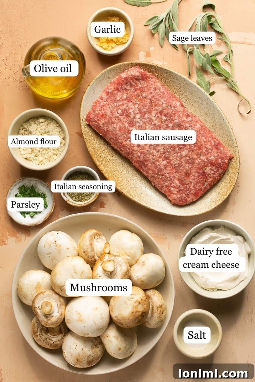 A collection of fresh ingredients for sausage stuffed mushrooms, including Italian sausage, fresh mushrooms, garlic cloves, cream cheese, and herbs, arranged in small bowls.