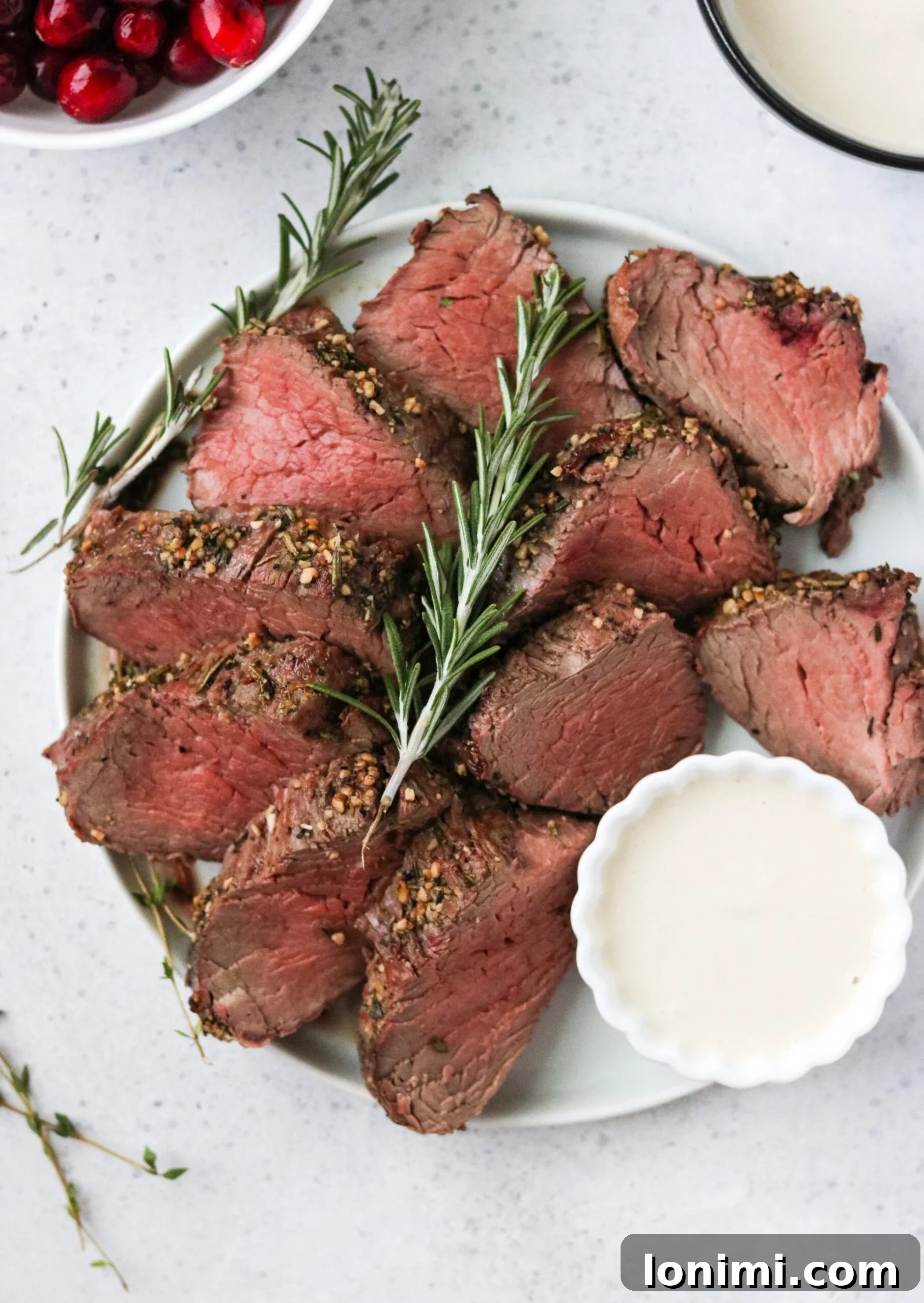 Pan-Seared Beef Tenderloin with Zesty Dairy-Free Horseradish Sauce 6 Sliced beef tenderloin with horseradish sauce, potatoes, and asparagus