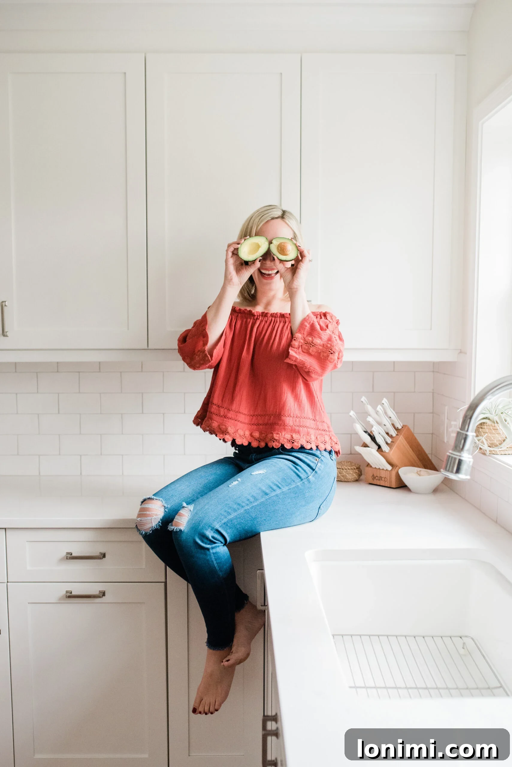 From Side Hustle to Main Gig: My Blogging Evolution 6 Blogger smiling proudly in her kitchen