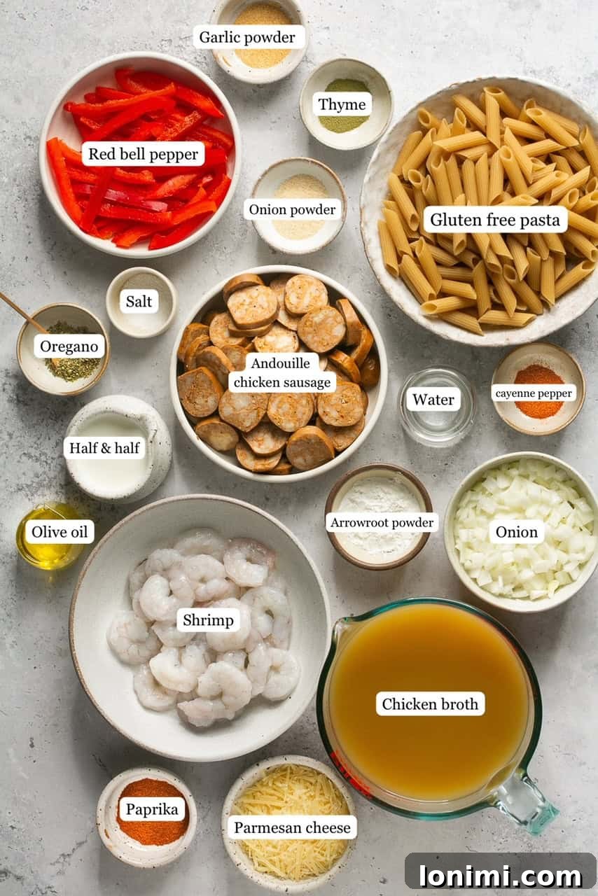 Ingredients for creamy gluten-free cajun pasta neatly arranged in nesting bowls