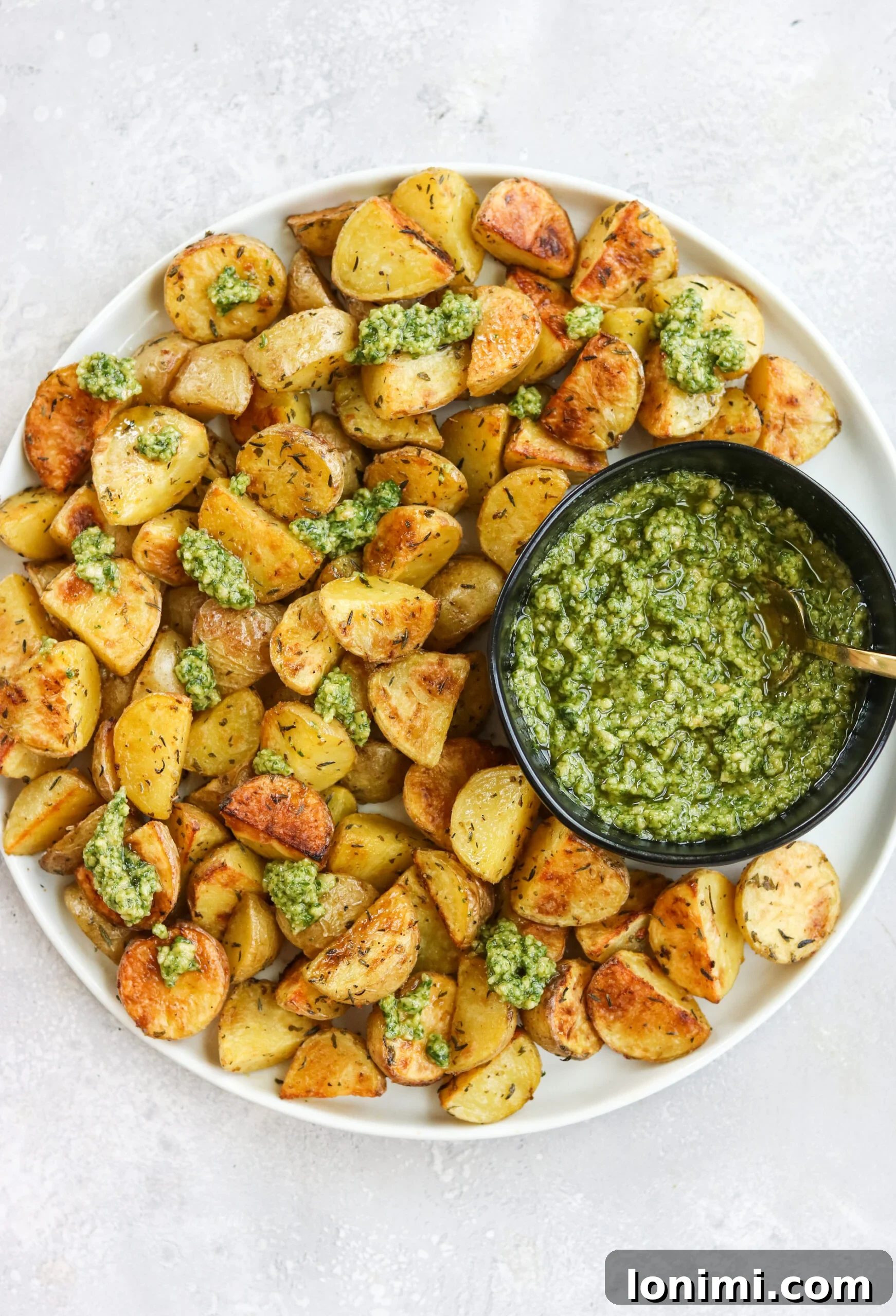 Crispy Herb Roasted Potatoes with Cashew Pesto, golden brown and perfectly seasoned