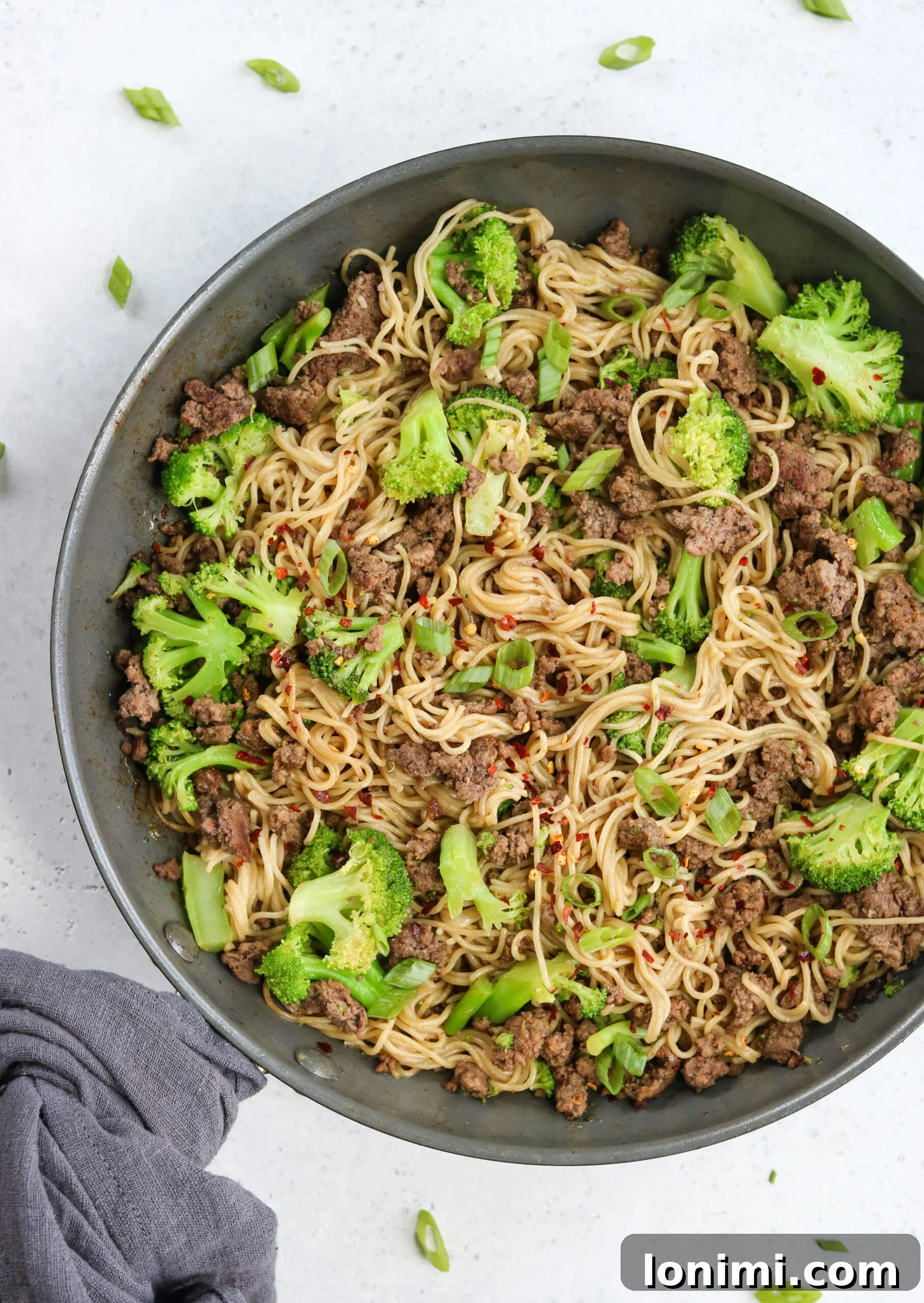 Savory Gluten Free Beef and Broccoli Ramen Stir Fry 2 A vibrant bowl of Beef and Broccoli Ramen Stir Fry, garnished with green onions.