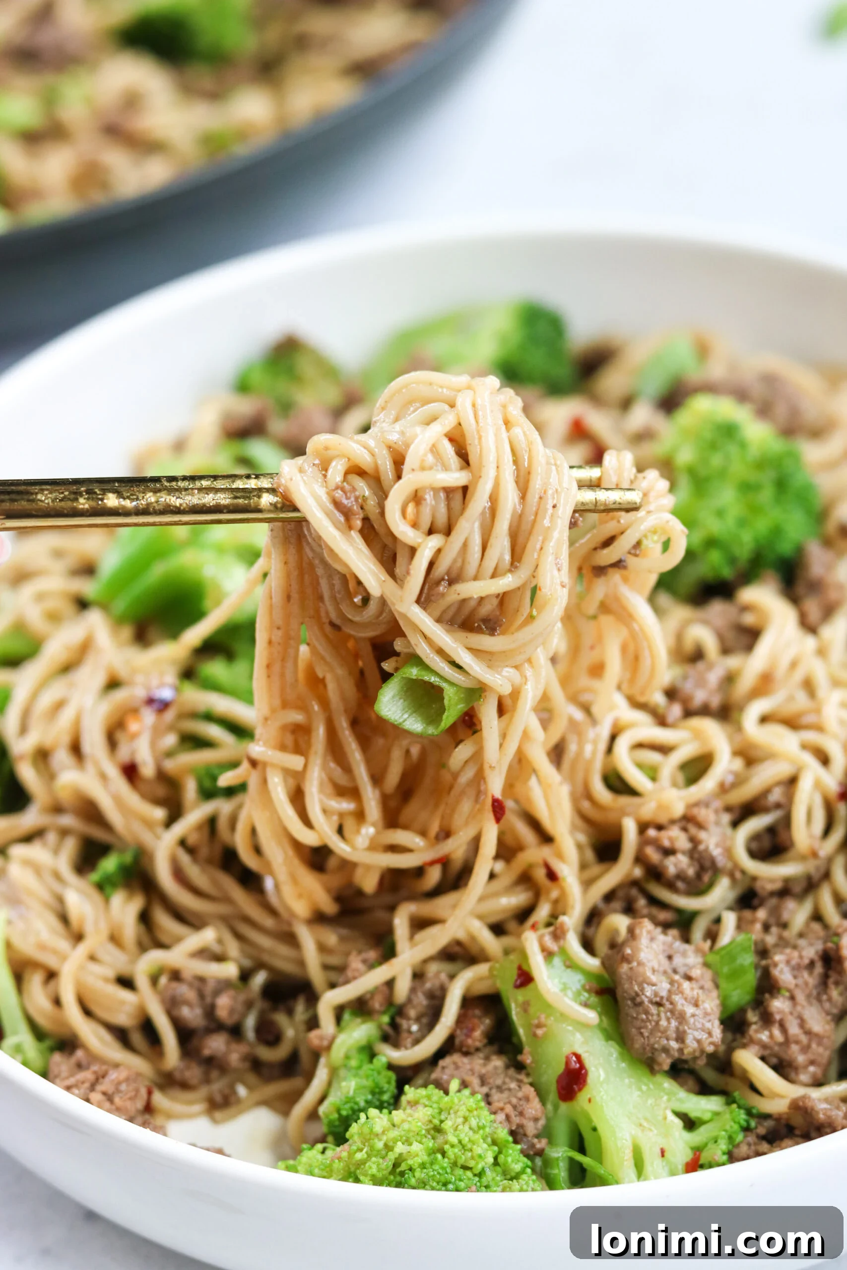 Savory Gluten Free Beef and Broccoli Ramen Stir Fry 5 A serving of Beef and Broccoli Ramen Stir Fry with chopsticks.