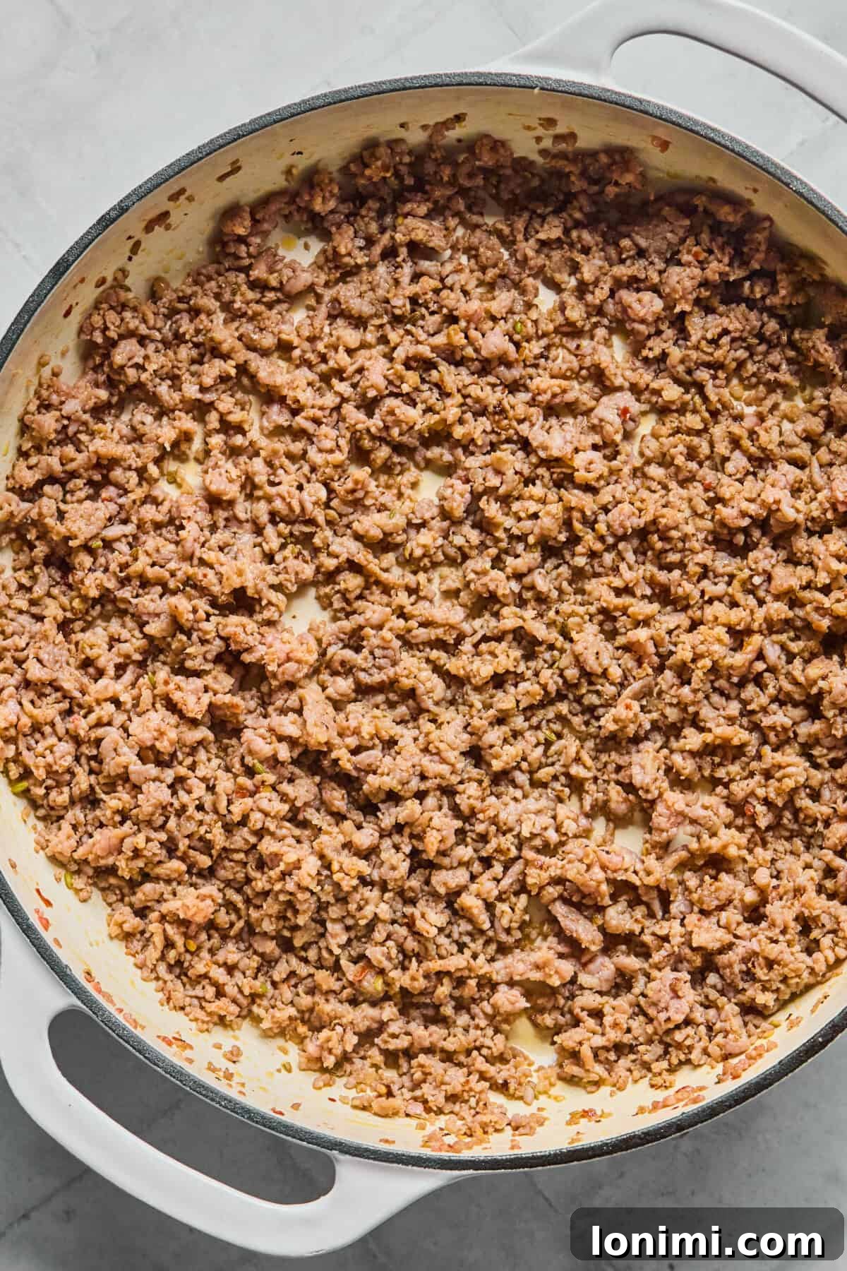 cooked sausage in a skillet