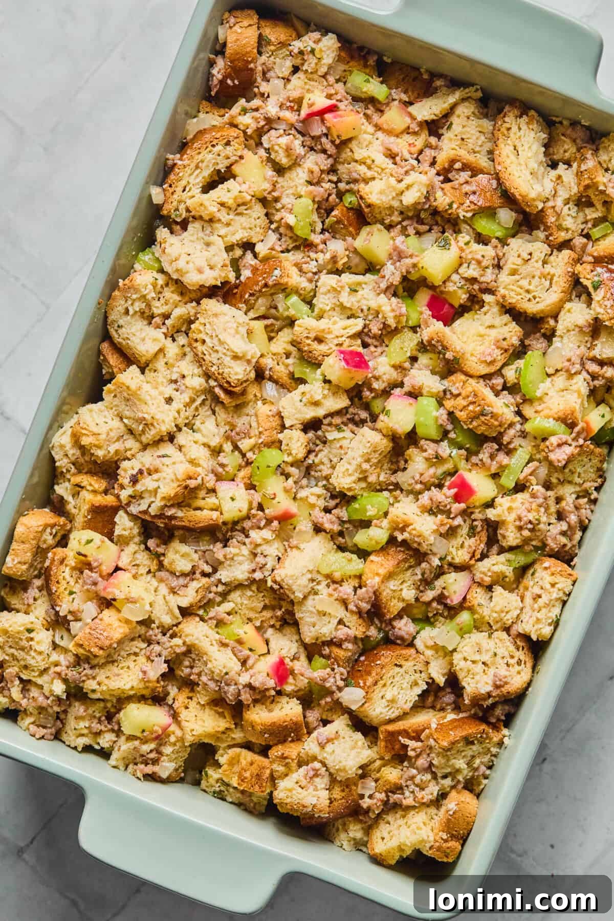 uncooked stuffing in a baking dish