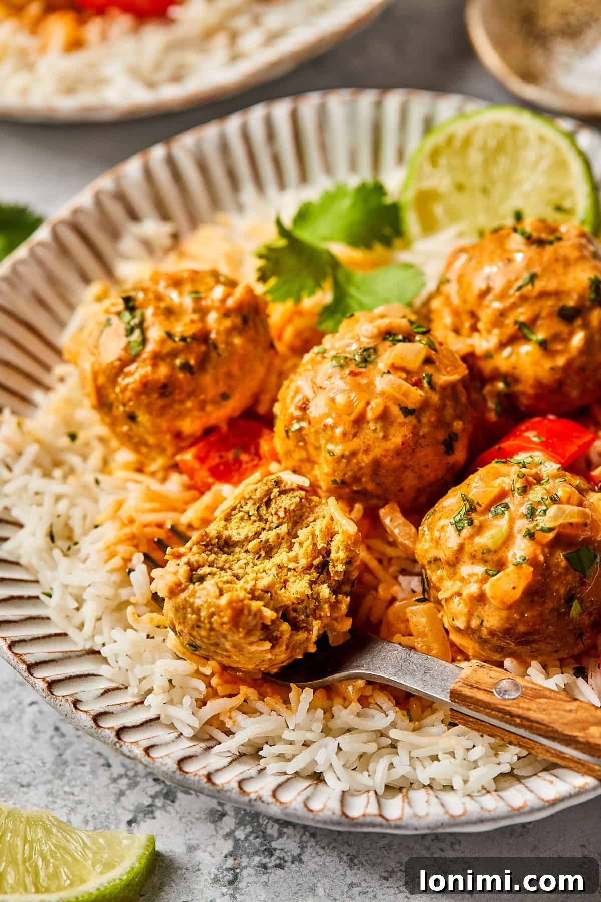a close up of a meatball cut in half to show the center