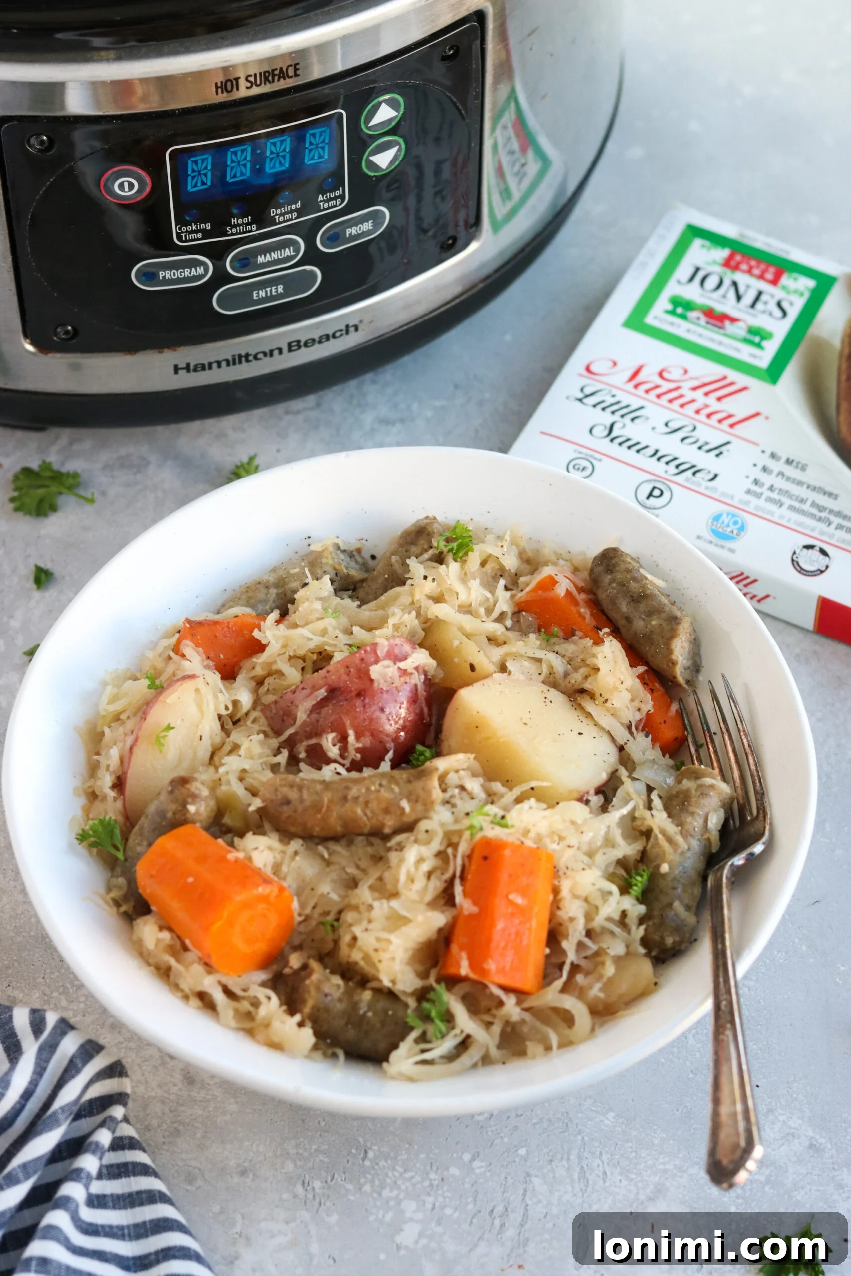 Slow Cooker Sweet and Savory Sausage with Apples and Sauerkraut 2 Delicious Slow Cooker Sausage, Sauerkraut, and Apples with fresh ingredients.