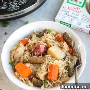 slow cooker sausage, apples, and sauerkraut