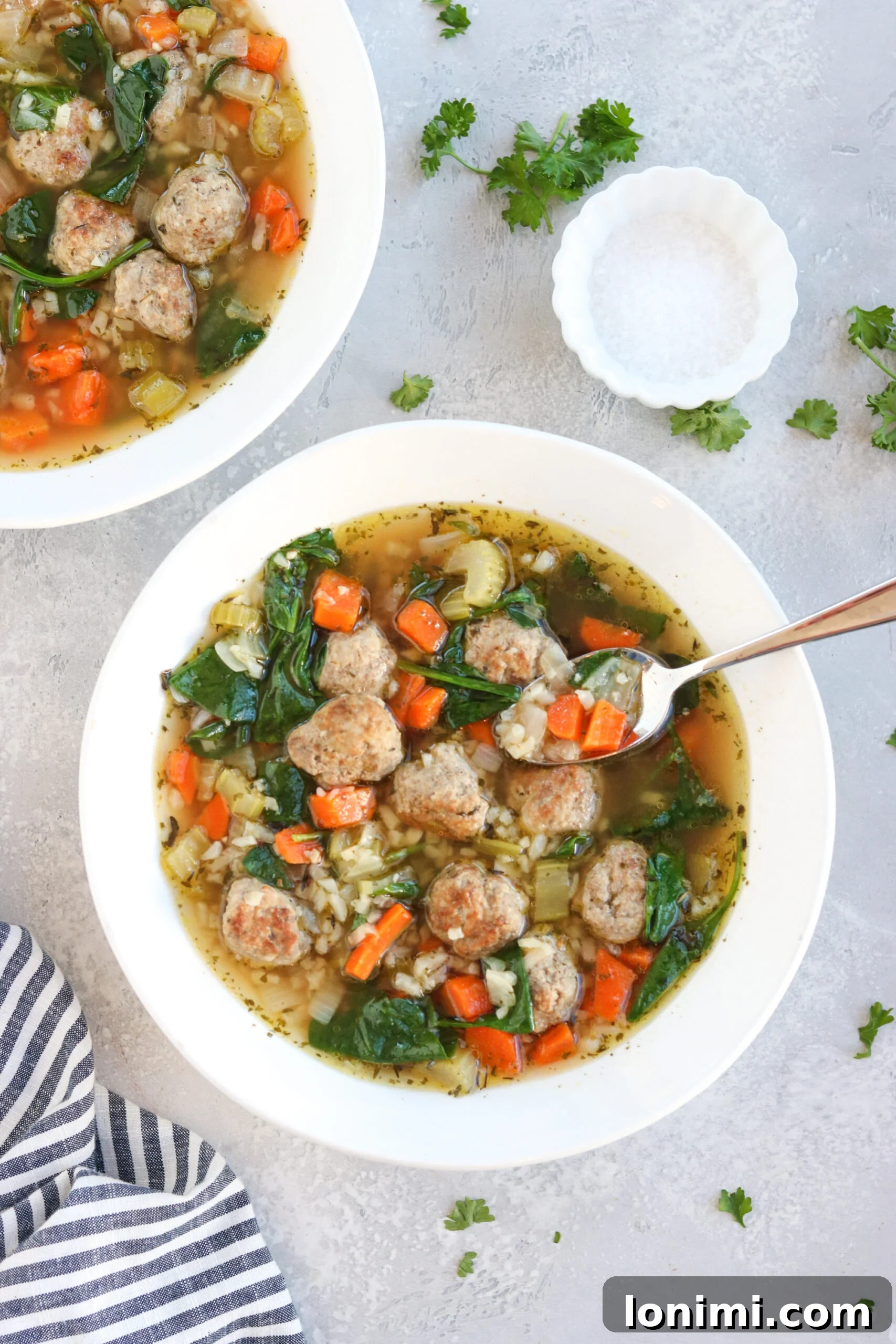 Hearty Whole30 Instant Pot Italian Wedding Soup 2 Delicious Whole30 Italian Wedding Soup made in the Instant Pot, brimming with meatballs and fresh vegetables.
