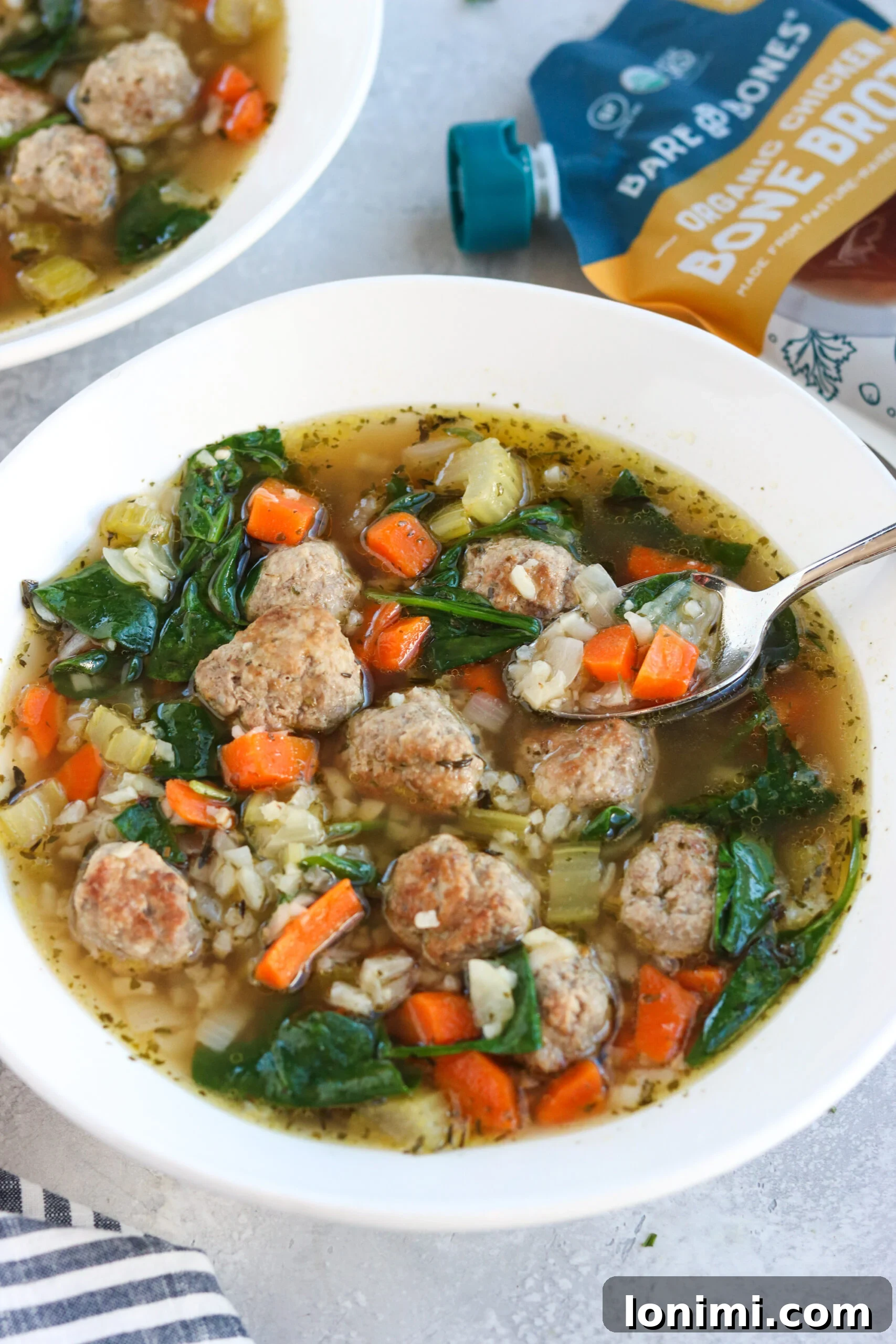 Hearty Whole30 Instant Pot Italian Wedding Soup 3 Close-up of healthy Italian Wedding Soup made with bone broth and nutrient-rich ingredients.