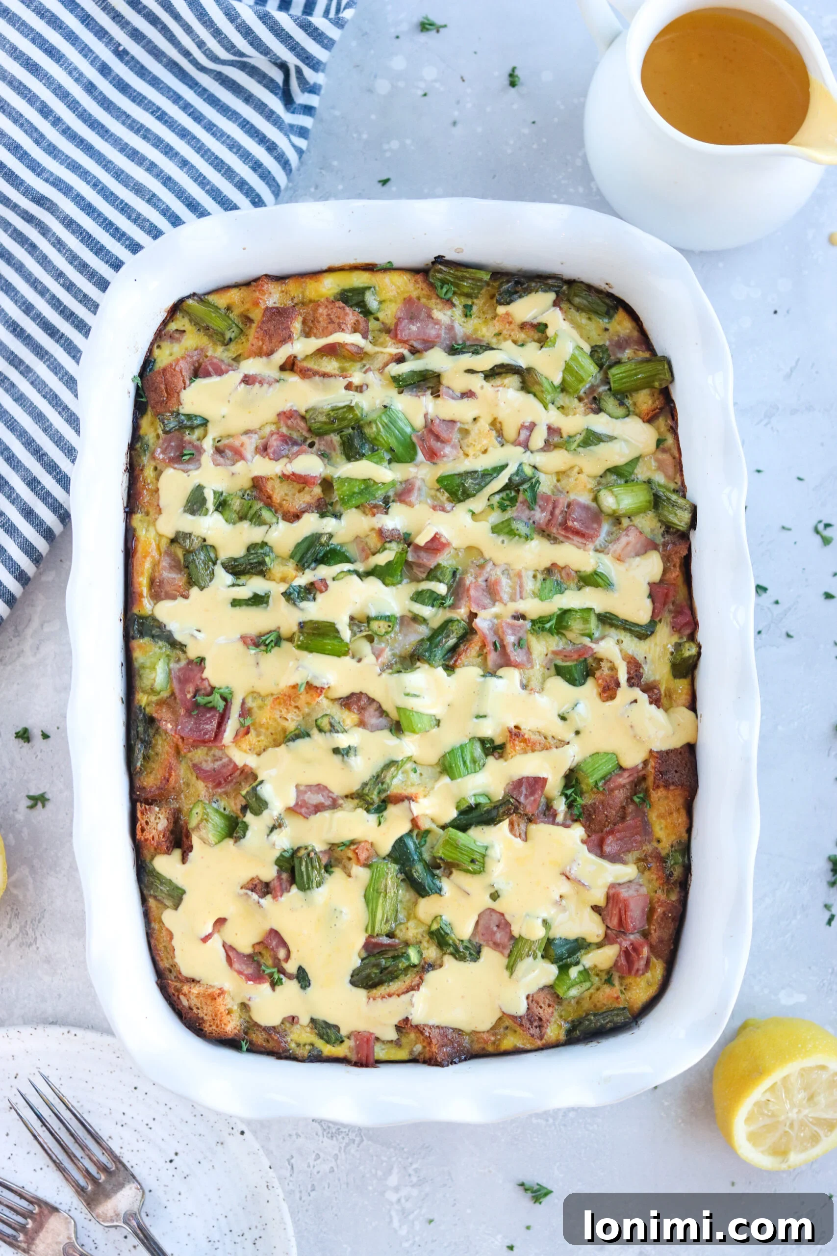 A closer look at the baked Gluten-Free Eggs Benedict Casserole, showcasing its golden-brown top and savory layers, perfect for a gourmet breakfast.