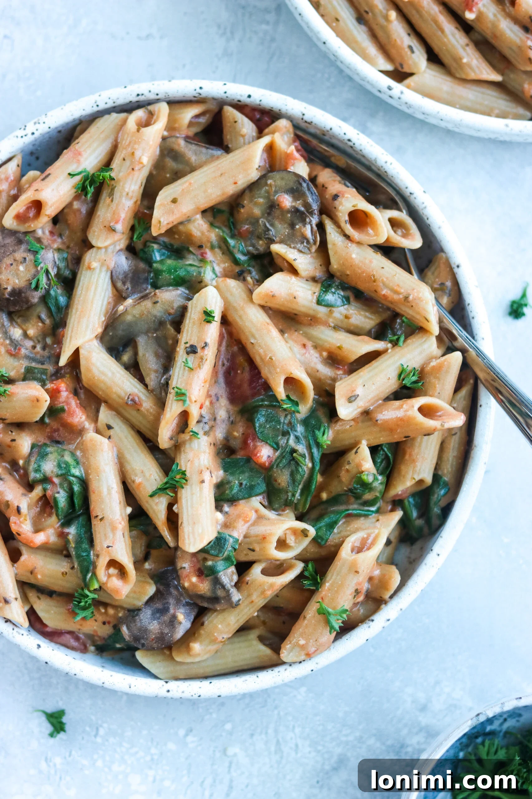 penne on a white bowl