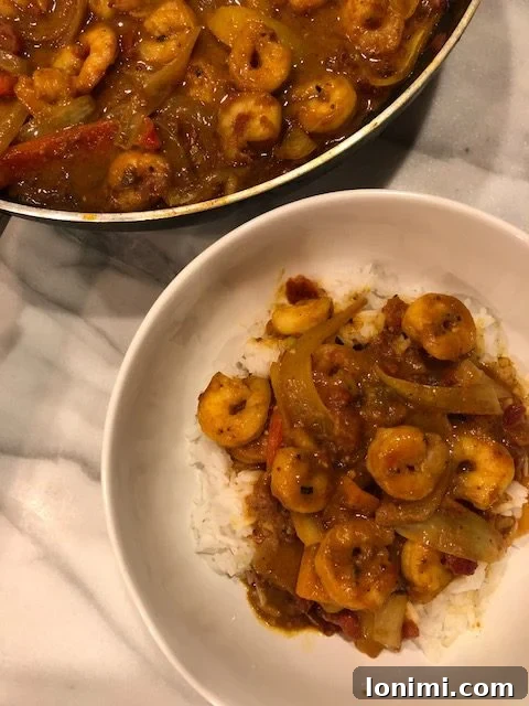Whole30 Approved Shrimp Tikka Masala 2 Delicious Whole30 Shrimp Tikka Masala served in a skillet