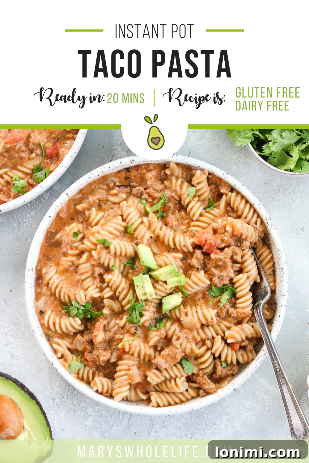 A person holding a bowl of Instant Pot Taco Pasta with a fork, ready to eat