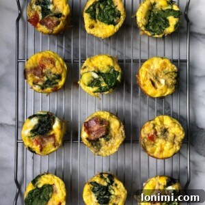BLT Egg Cups with bacon, spinach, and tomato, a Whole30 compliant breakfast