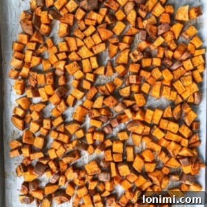 Dish of roasted sweet potatoes, ready to serve
