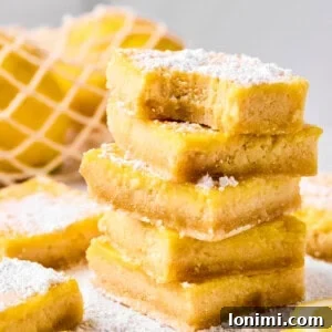 5 lemon bars stacked on top of each other