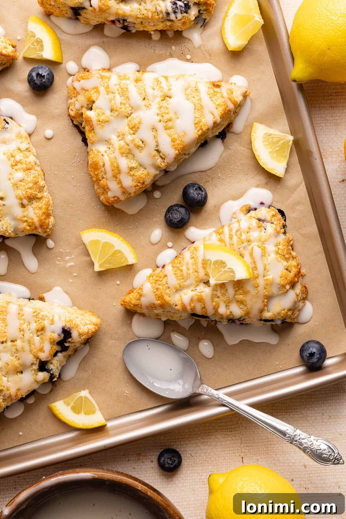 Effortless Gluten Free Blueberry Lemonade Scones 8 a baking sheet with parchment and scones