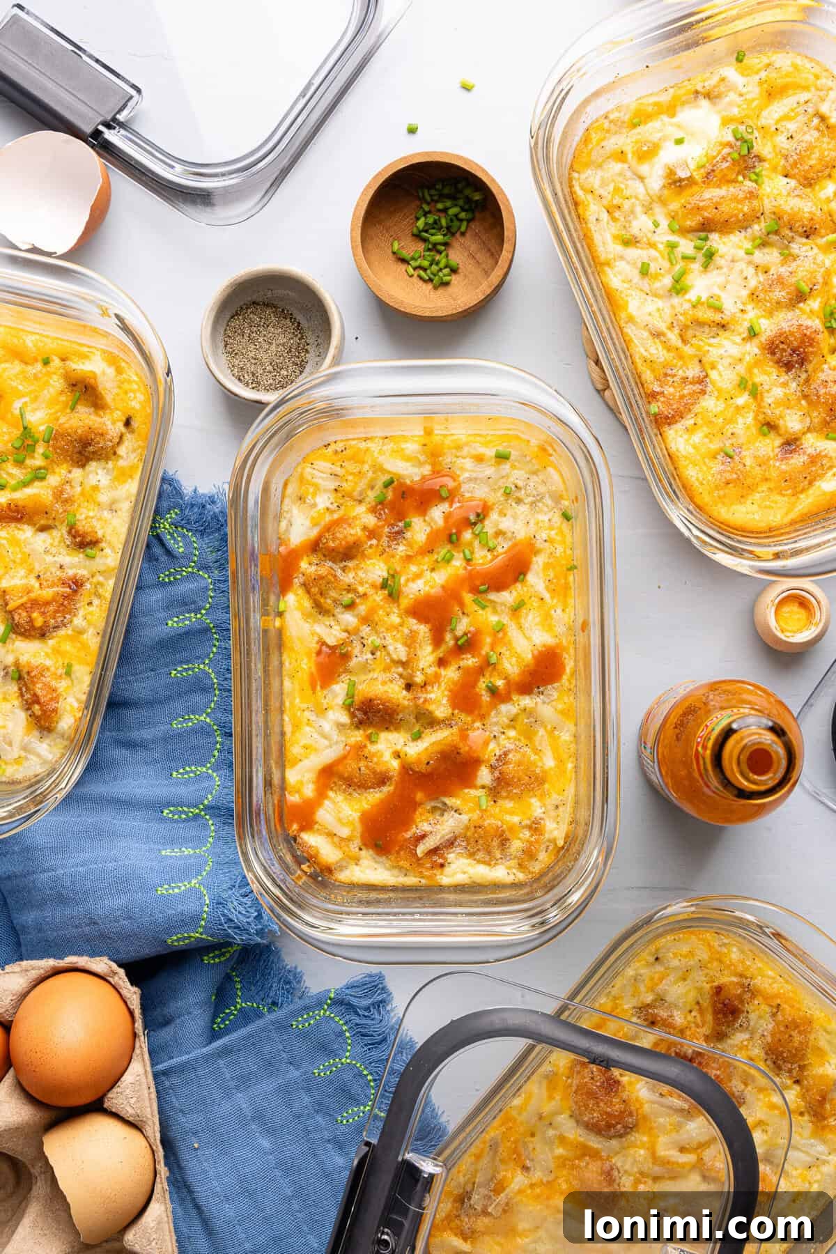 Craft Your Own Chick-fil-A Hash Brown Scramble Bowls 8 hash brown scramble bowls in glass containers topped with hot sauce