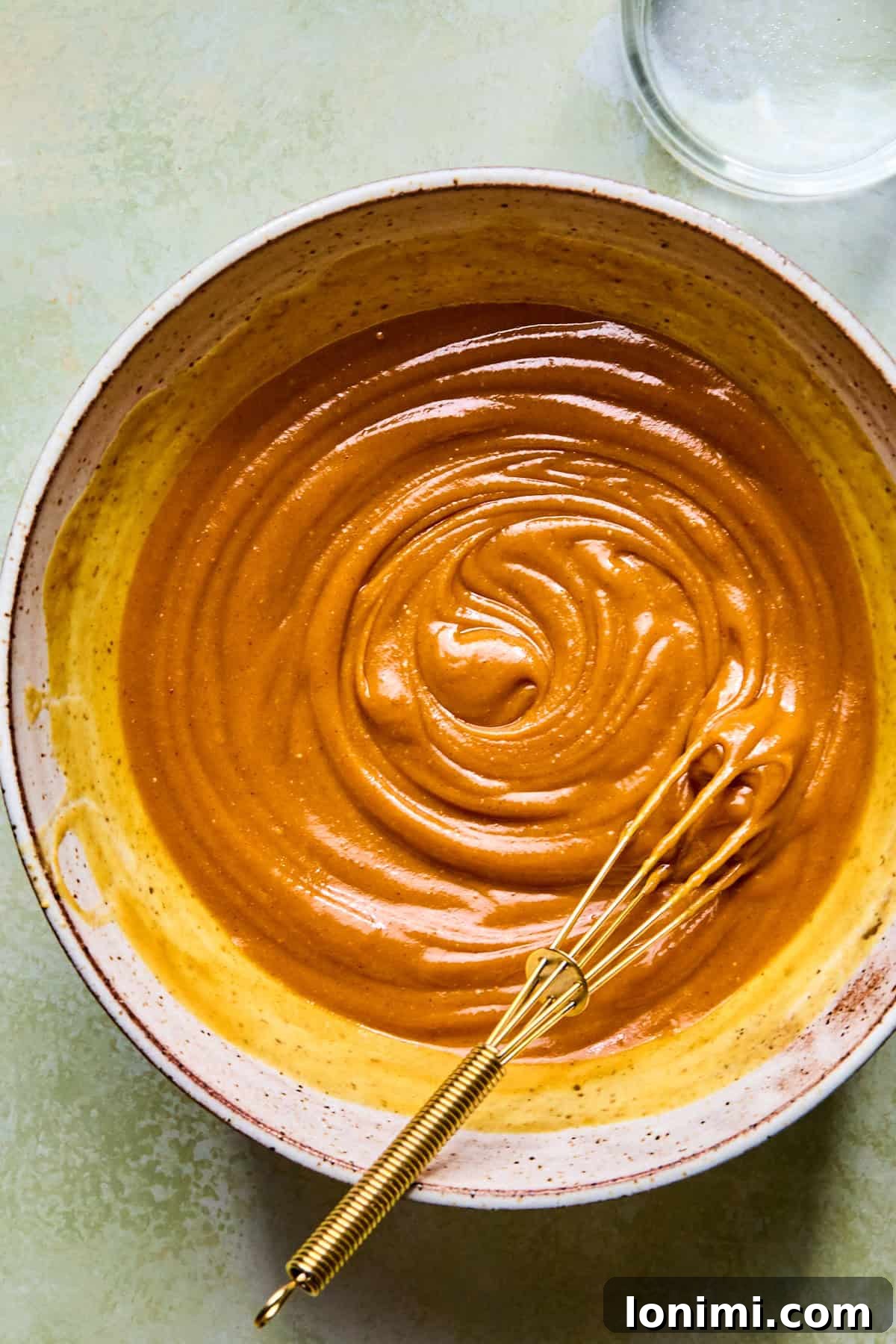 Peanut sauce ingredients mixed together in a bowl.