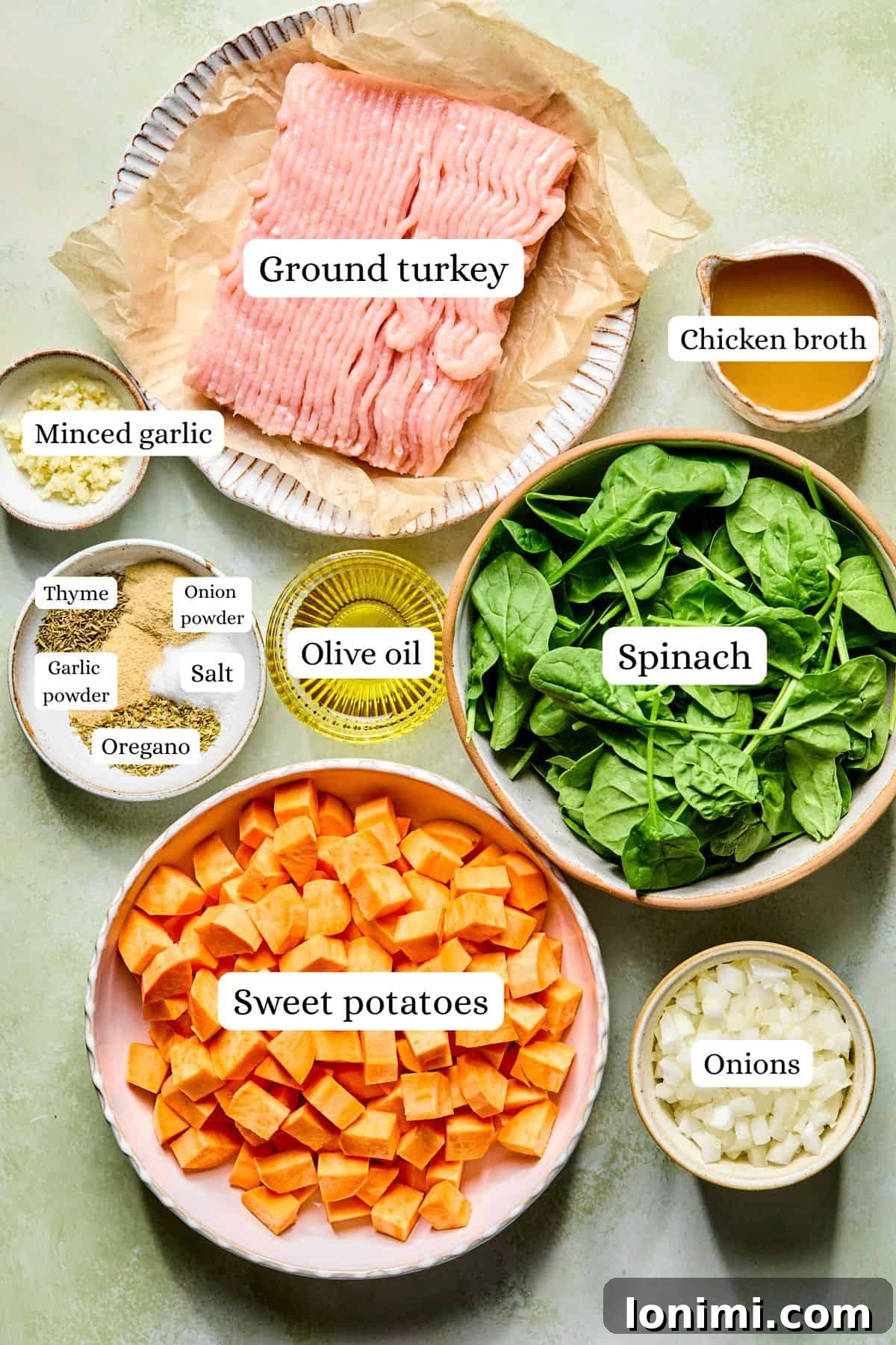 ingredients for grounf turkey sweet potato hash in nesting bowls