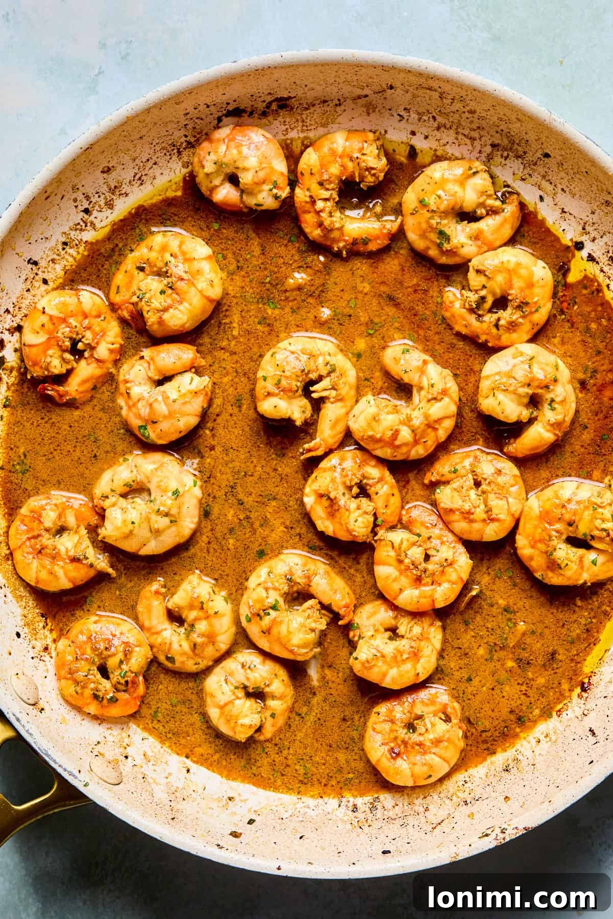 shrimp cooking in a skillet